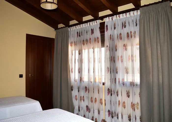 Versos 빌라 San Martín del Castañar