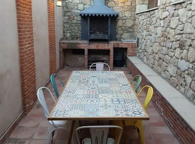 Versos 빌라 San Martín del Castañar